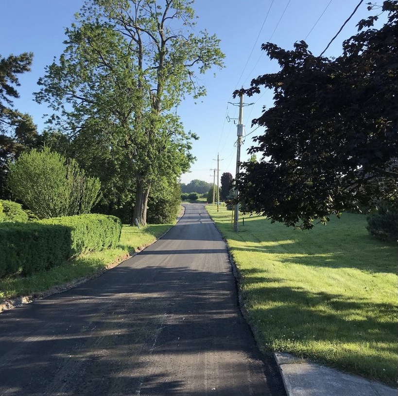 Freshly paved long driveway